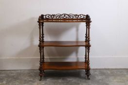 A Victorian rosewood whatnot, mid-19th century