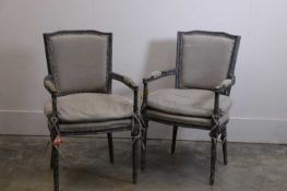A pair of painted elbow chairs, modern, believed to be by OKA,