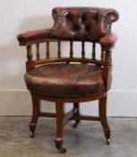 A Victorian walnut revolving desk chair late-19th century,
