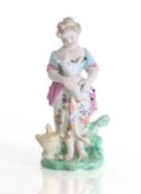 A Derby figure of a young girl with a lamb, 19th century,