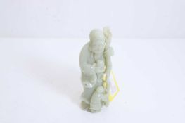 A Chinese carved jade figure of Shoulao, 20th century,