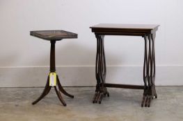A nest of three mahogany inlaid tables, 20th century,