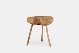 A rustic tree slice chopping block, 20th century,