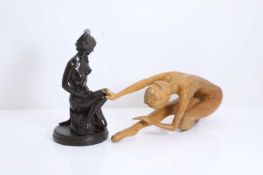 A carved ballet dancer, of recent manufacture,