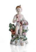 A Continental porcelain figure of a flower-gathering putto, 19th century,
