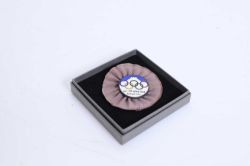 A Tokyo XII Olympiad badge, dated 1940,