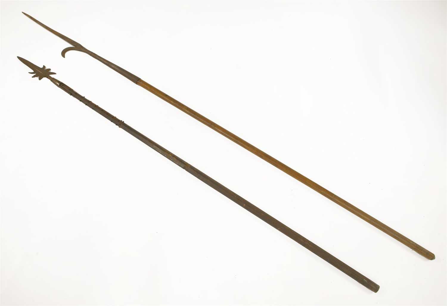 Sw Halbard Two halberds, with barbed/shped metal heads and wooden shaftsShipping ...