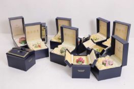 A collection of twelve Halcyon Days enamelled 'Bouquet Seals', modern,