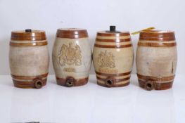 A group of four novelty liquor barrels, late 19th century,