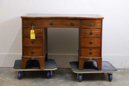 A mahogany inverted front pedestal desk, 20th century,