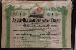 A collection of share certificates,