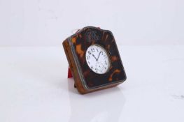 A tortoiseshell and silver mounted travelling timepiece, circa 1900,