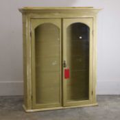 A Pine painted and patinated glazed bookcase, late 19th century,
