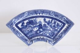 A Caughley 'Fan-Panelled Landscape' powder blue dessert plate, circa 1780,