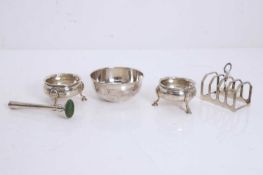 A collection of silver table items,