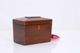 A mahogany tea caddy,