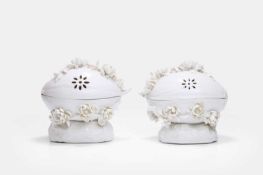 A pair of Saint-Cloud-style porcelain potpourri bowls and covers, 19th century,