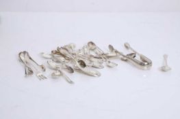 A collection of silver flatware,