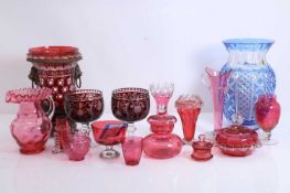 A collection of cranberry glass items, late 19th and 20th century,