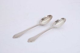 A pair of Queen Anne silver dog nose finial tablespoons,