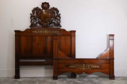 A Spanish mahogany inlaid bed, 20th century,