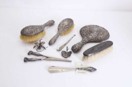A collection of silver dressing table items,
