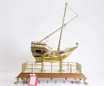 A brass model of a ship, 20th century,
