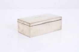 A silver cigarette box,