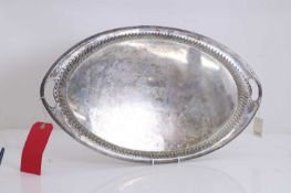 A larger silver serving tray,