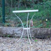 A painted metal garden table, 20th century,