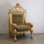 A stylised carved armchair,