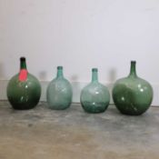 A collection of four demijohns, 20th century, Spanish,