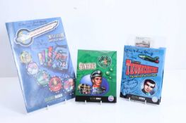 A signed Thunderbirds limited edition gambling chips,