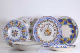 A collection of Spanish plates and bowls, 18th to 19th century,