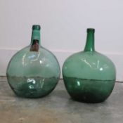 A matched pair of demijohns, 20th century, Spanish,