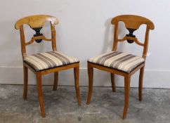 A pair of Biedermeier maple and ebonised side chairs, 19th century,
