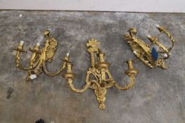 A composed set Louis XV-style gilt-metal wall appliques or sconces, late 19th / early 20th century,