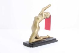 An Art Deco style gilded figure, late 20th century,