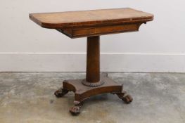 A late Regency oak pedestal tea table, c.1825,