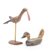 A pair of French naïve painted wooden decoys, early 19th century,