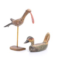 A pair of French naïve painted wooden decoys, early 19th century,