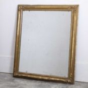 A Continental giltwood wall mirror, early 20th century,