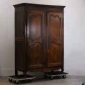 A provincial French oak armoire, early 19th century,