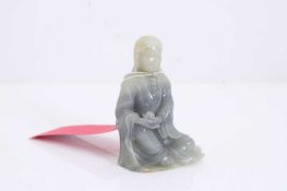 A Chinese carved jade figure of a luohan, 20th century,