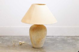 A large terracotta table lamp, of modern manufacture,