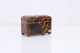 A plain tortoiseshell tea caddy, 19th century,