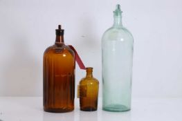 Two large glass bottles with stoppers, 20th century,