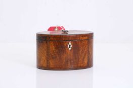 A crossbanded flame veneered tea caddy,