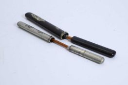 Two Japanese kiseruzutsu with kiseru, Meiji period (1868-1912),