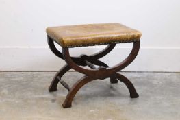 A mahogany X-framed stool, c.1890,